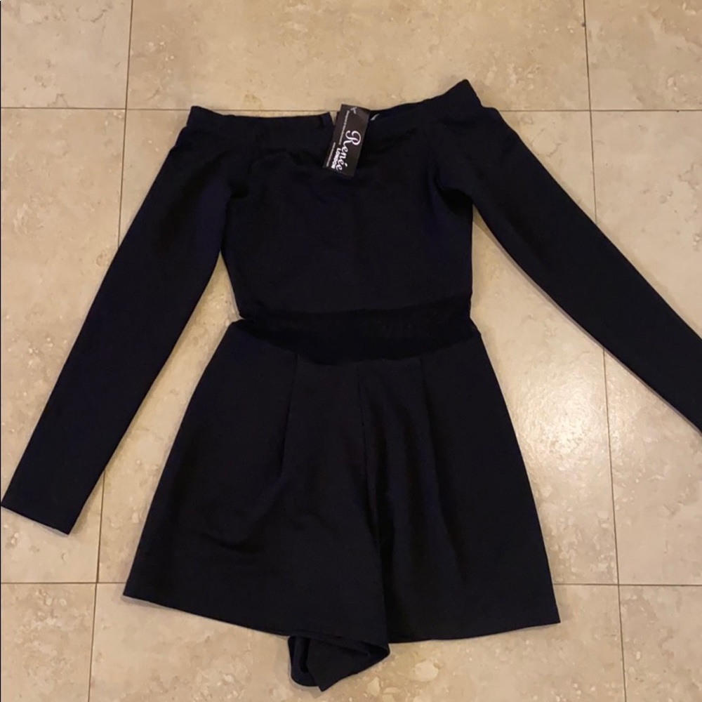 Black sheer romper by Renee London